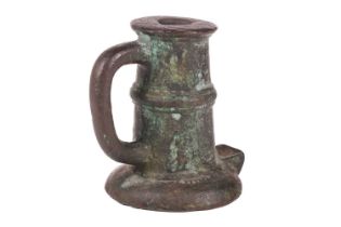 A 17th or 18th-century bronze thunder mug (signal cannon), with loop handle and ribbed centre, on