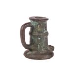 A 17th or 18th-century bronze thunder mug (signal cannon), with loop handle and ribbed centre, on a 