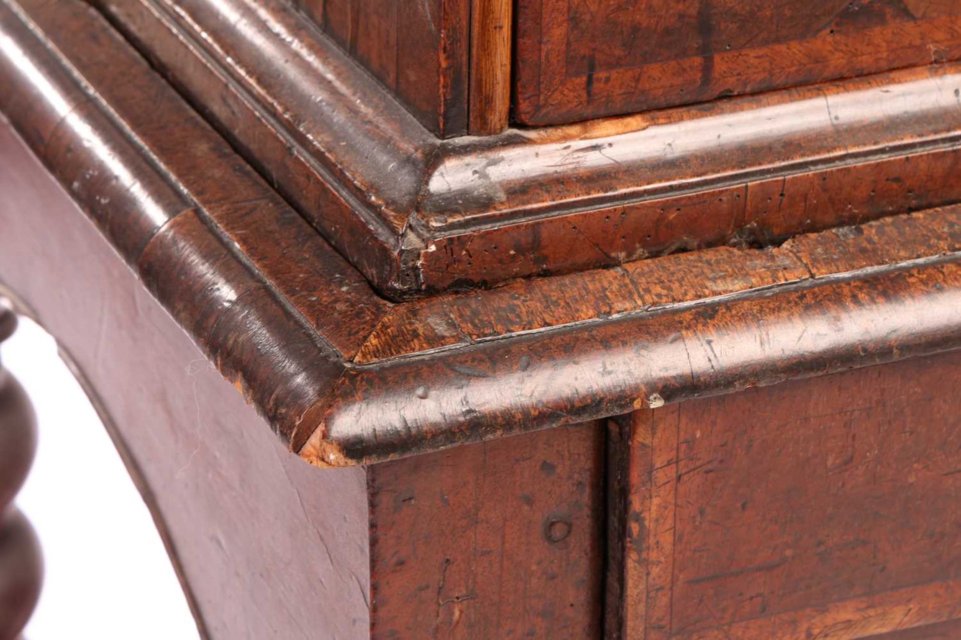 A 17th-century and later figured walnut chest on stand, the upper section with quarter veneered top  - Image 4 of 7