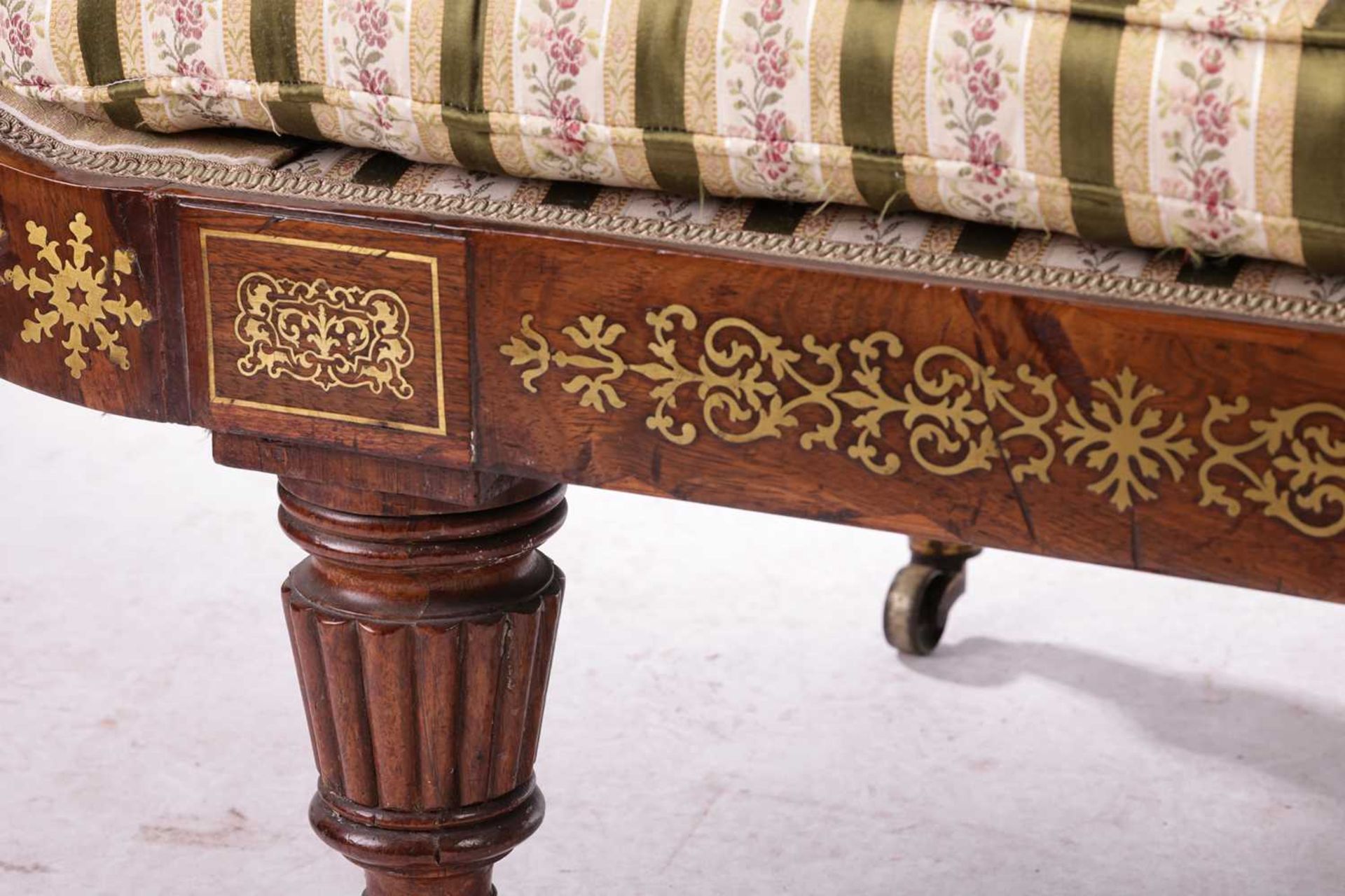 In the manner of John McLean a Regency brass inlaid rosewood double scroll chaise longue, with spent - Image 4 of 11