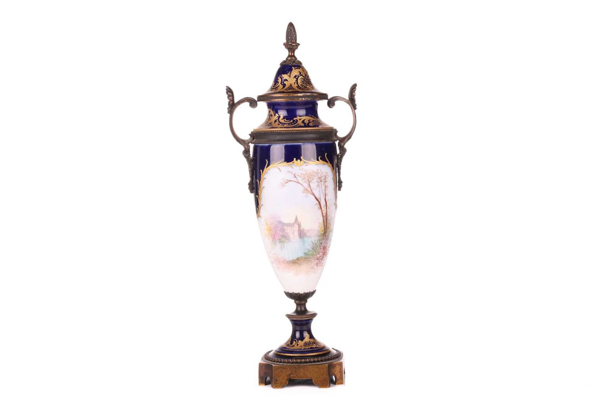 A 19th-century Sevres porcelain vase and cover, decorated with a courting couple, a chateau and lake - Image 6 of 6