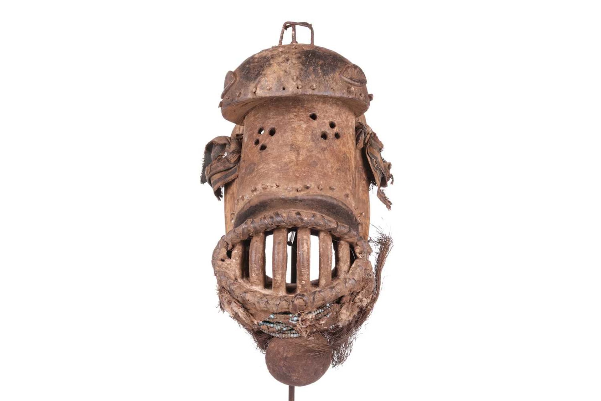 An unusual Bete Nyabwa mask, with turquoise bead decoration, 20th century, 41 cm x 19 cm. NB: Displa