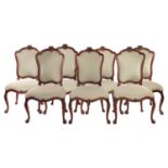 A set of seven George II style walnut cartouch backed dining chairs, possibly Irish C1900, the set c