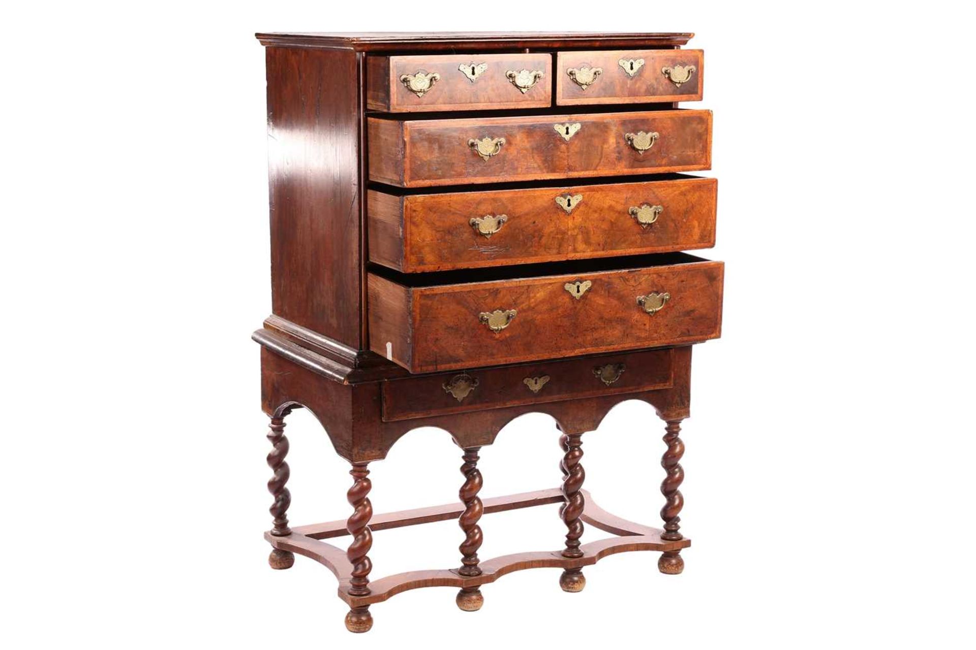 A 17th-century and later figured walnut chest on stand, the upper section with quarter veneered top  - Image 5 of 7