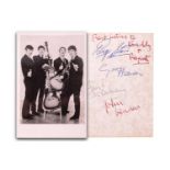 The Beatles: an original black and white signed postcard, early 1960s, with dedication verso in John