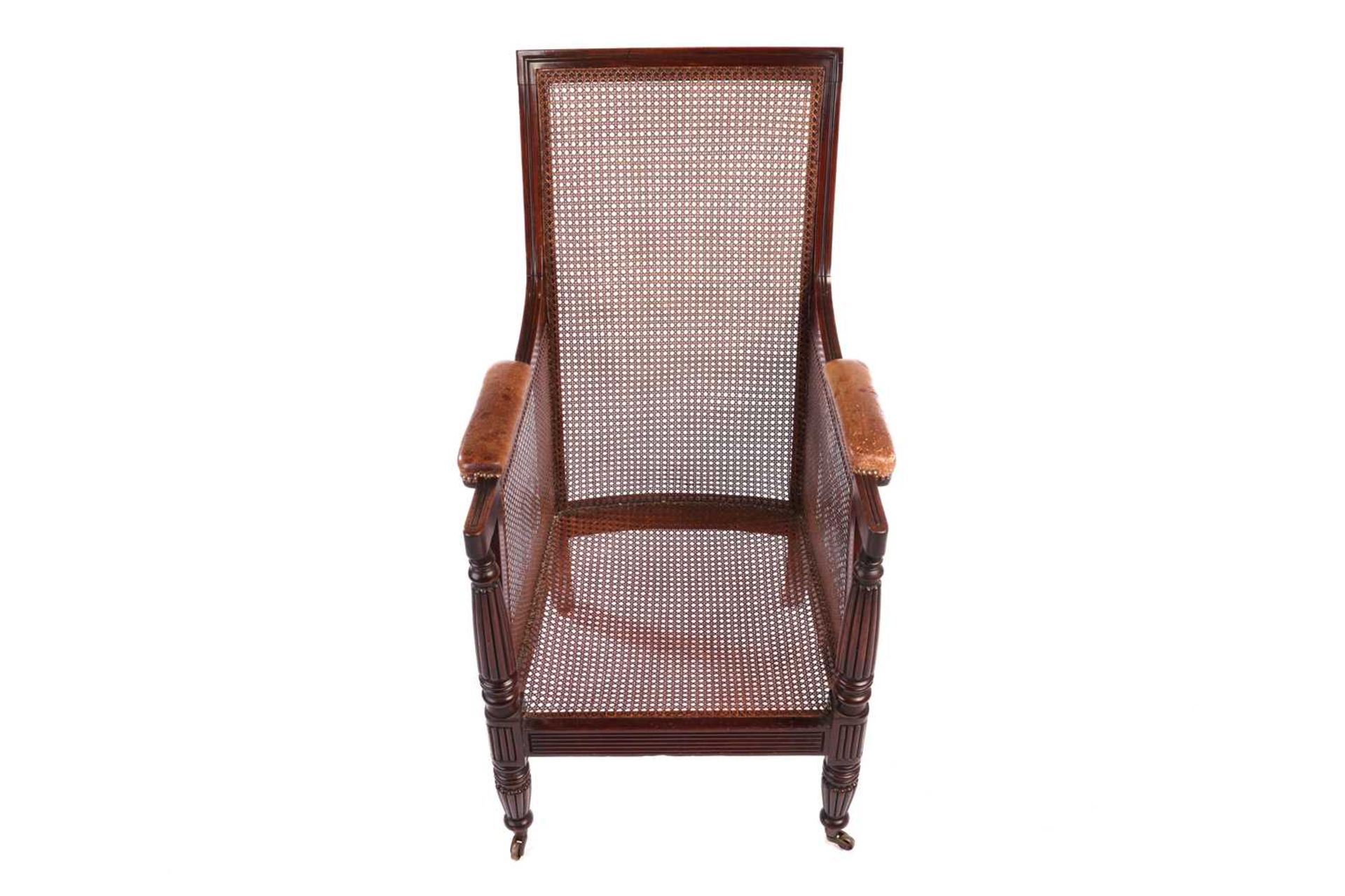 A William IV mahogany bergere library armchair, in the manner of Gillow of Lancaster with square spl - Bild 5 aus 18