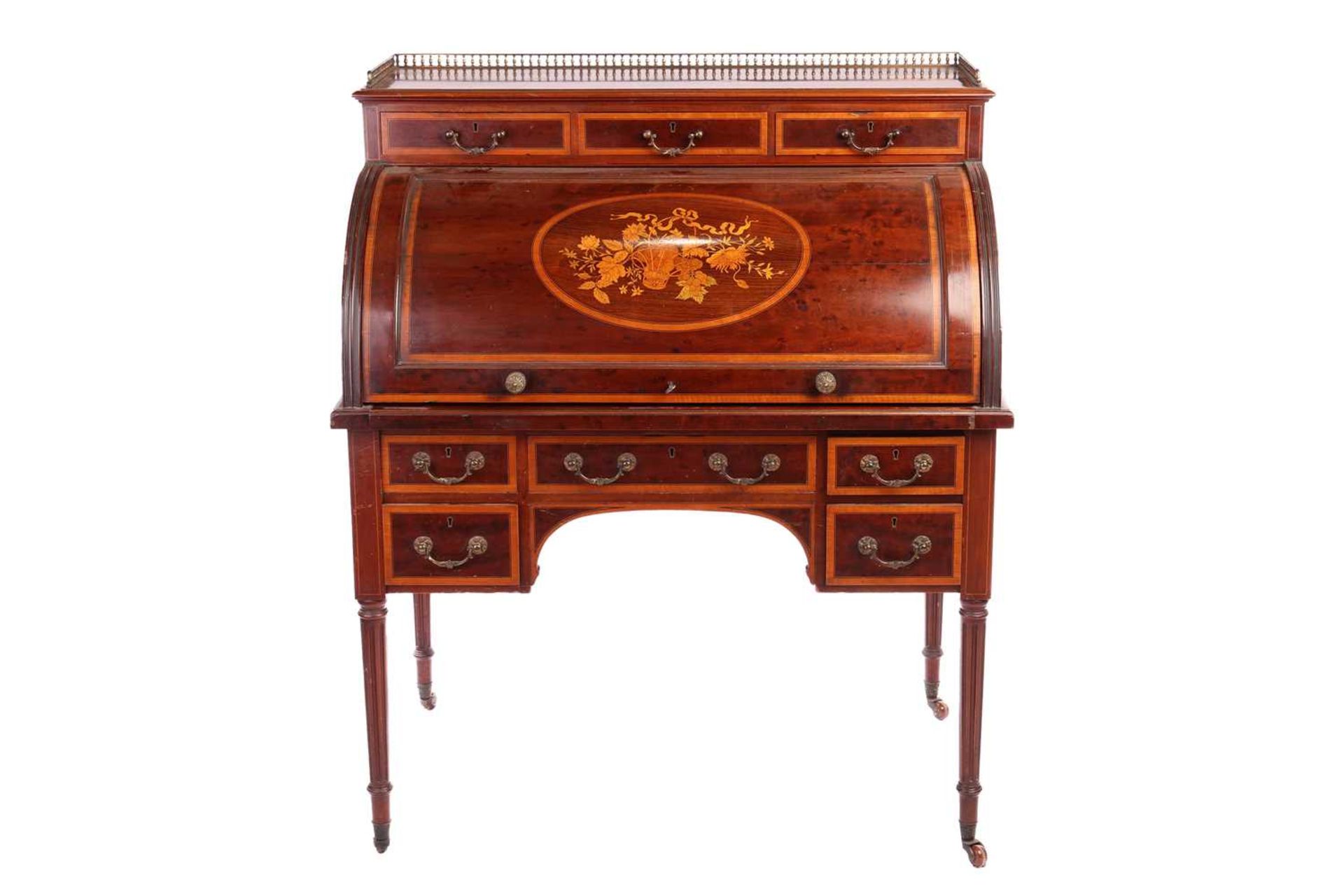 A Hobbs &amp; Co, Edwardian 'plum pudding' mahogany and marquetry cylinder writing bureau with a thr