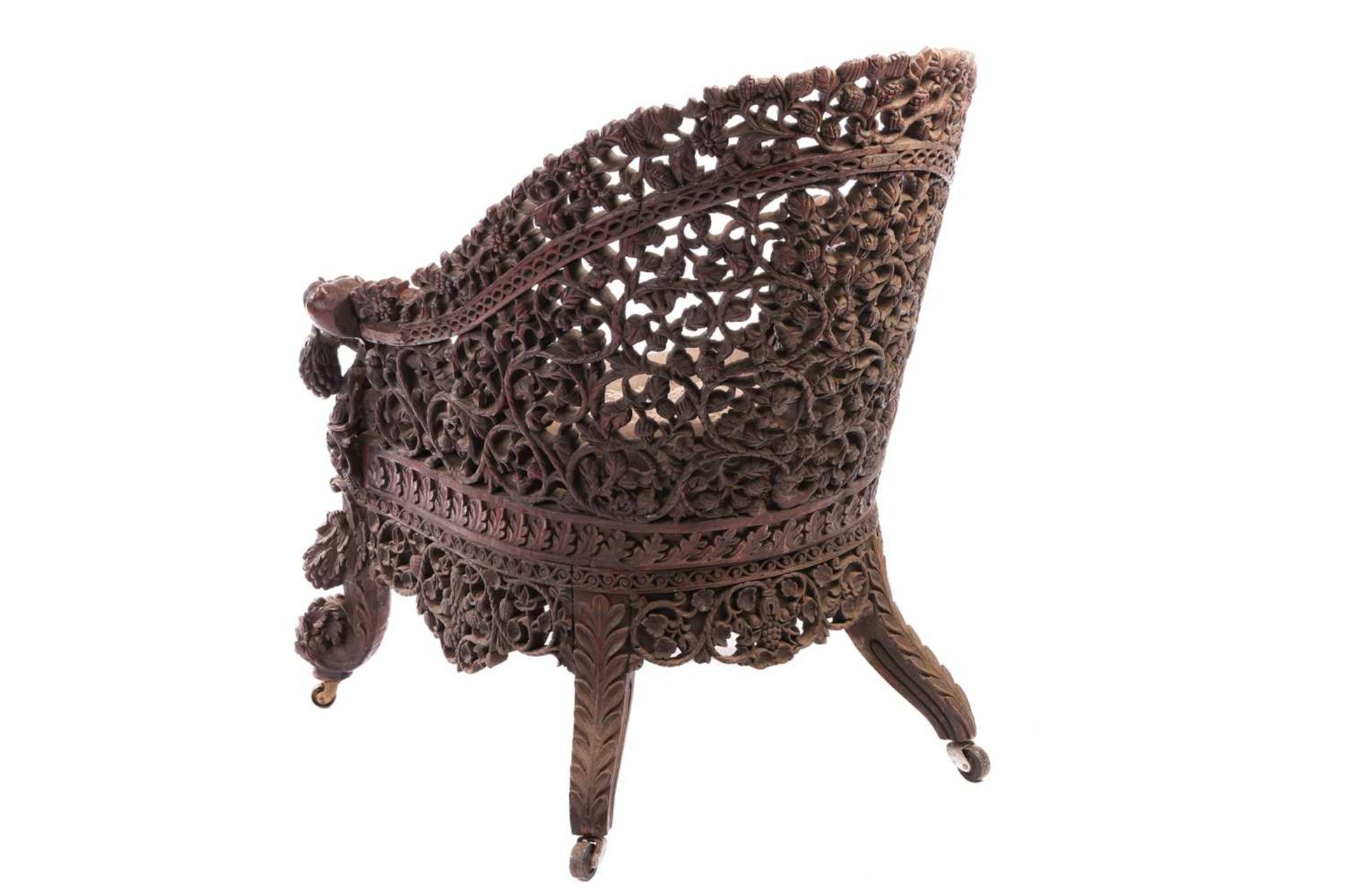 A Bombay Presidency carved rosewood arched back armchair, C1860s profusely carved with Indian strawb - Bild 6 aus 16