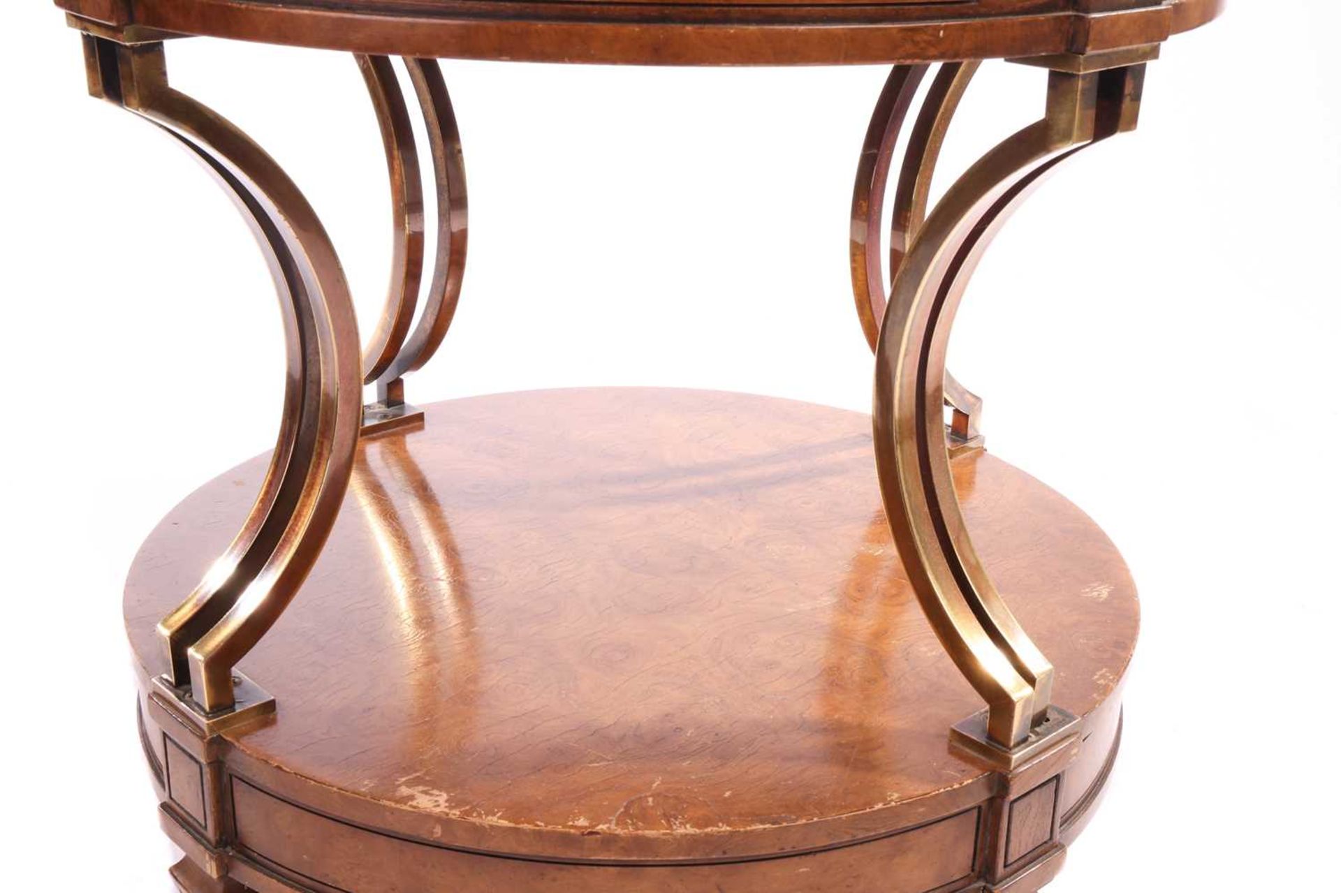 A French Empire-style two-tier drum burr walnut table with concave gilt brass supports over a confor - Image 5 of 10