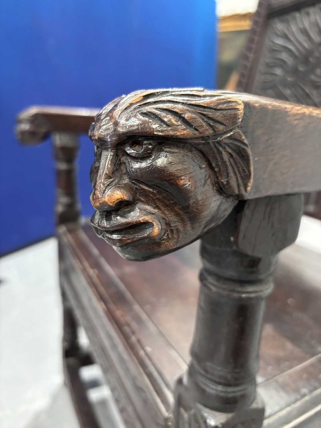 An oak wainscot armchair, 17th century and later, with carved decoration, the arms terminating in ca - Image 8 of 26