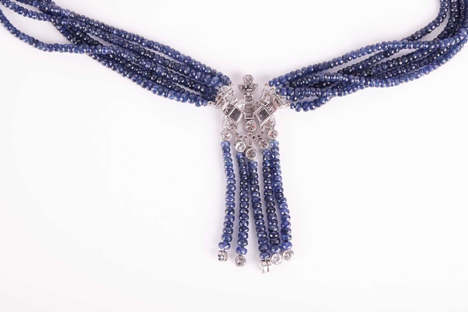 An Art Deco style beaded sapphire and diamond sautoir necklace, composed of five strands of faceted  - Image 4 of 4