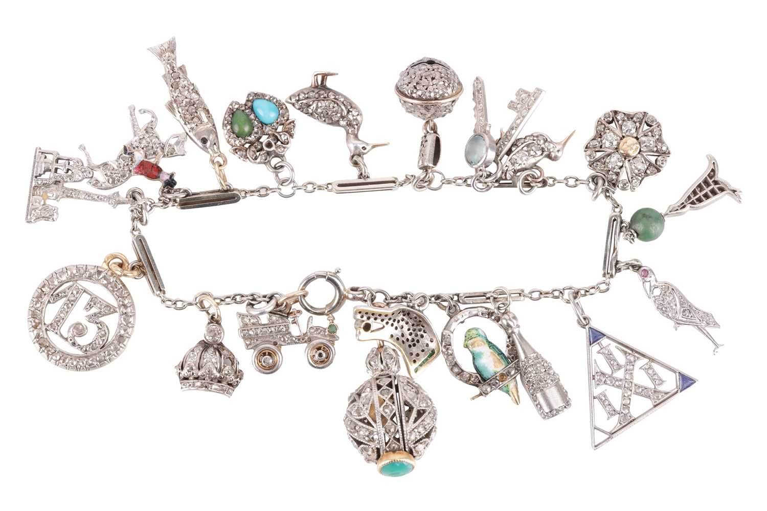 An Art Deco gem-set charm bracelet, two signed Cartier; composed of a series of cable and bar links,