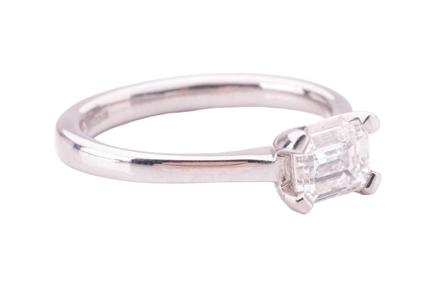 A diamond solitaire ring, featuring an emerald-cut diamond, with an estimated carat, colour and clar - Image 2 of 5