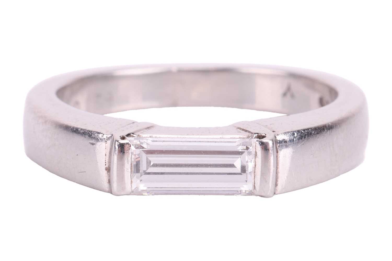 A diamond solitaire platinum ring, featuring a baguette-cut diamond, with an estimated carat weight  - Image 2 of 8