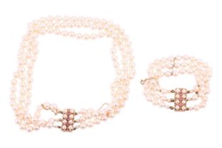 A three-strand pearl choker necklace and matching bracelet, the cultured pearls of cream body colour