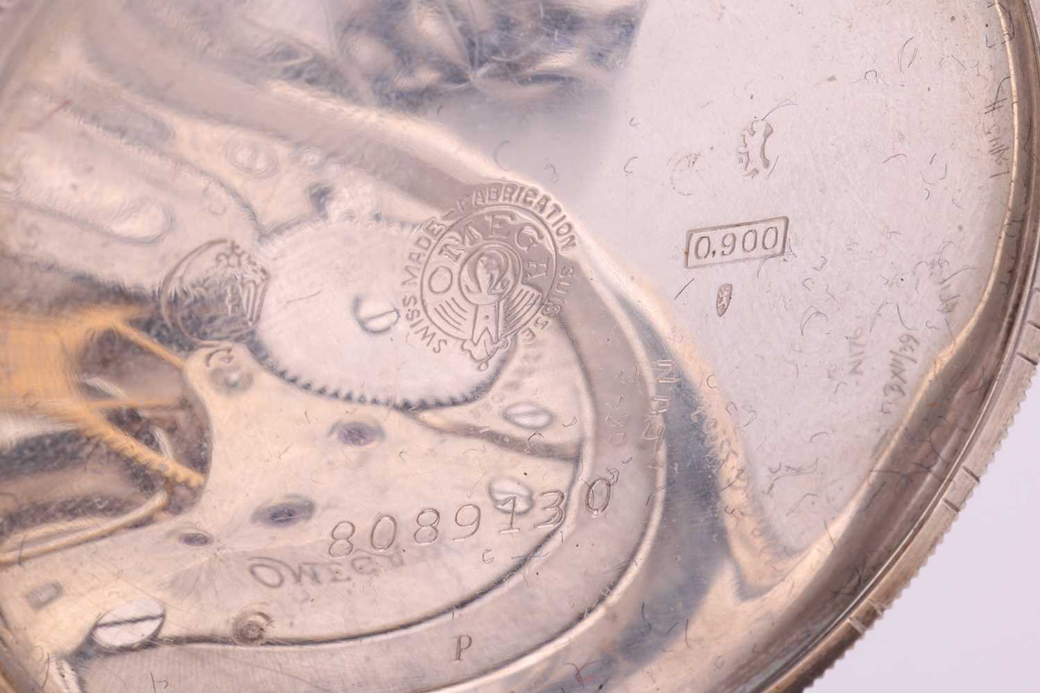 An Omega open-face pocket watch and chain, featuring a keyless wound movement in a silver case measu - Image 5 of 5