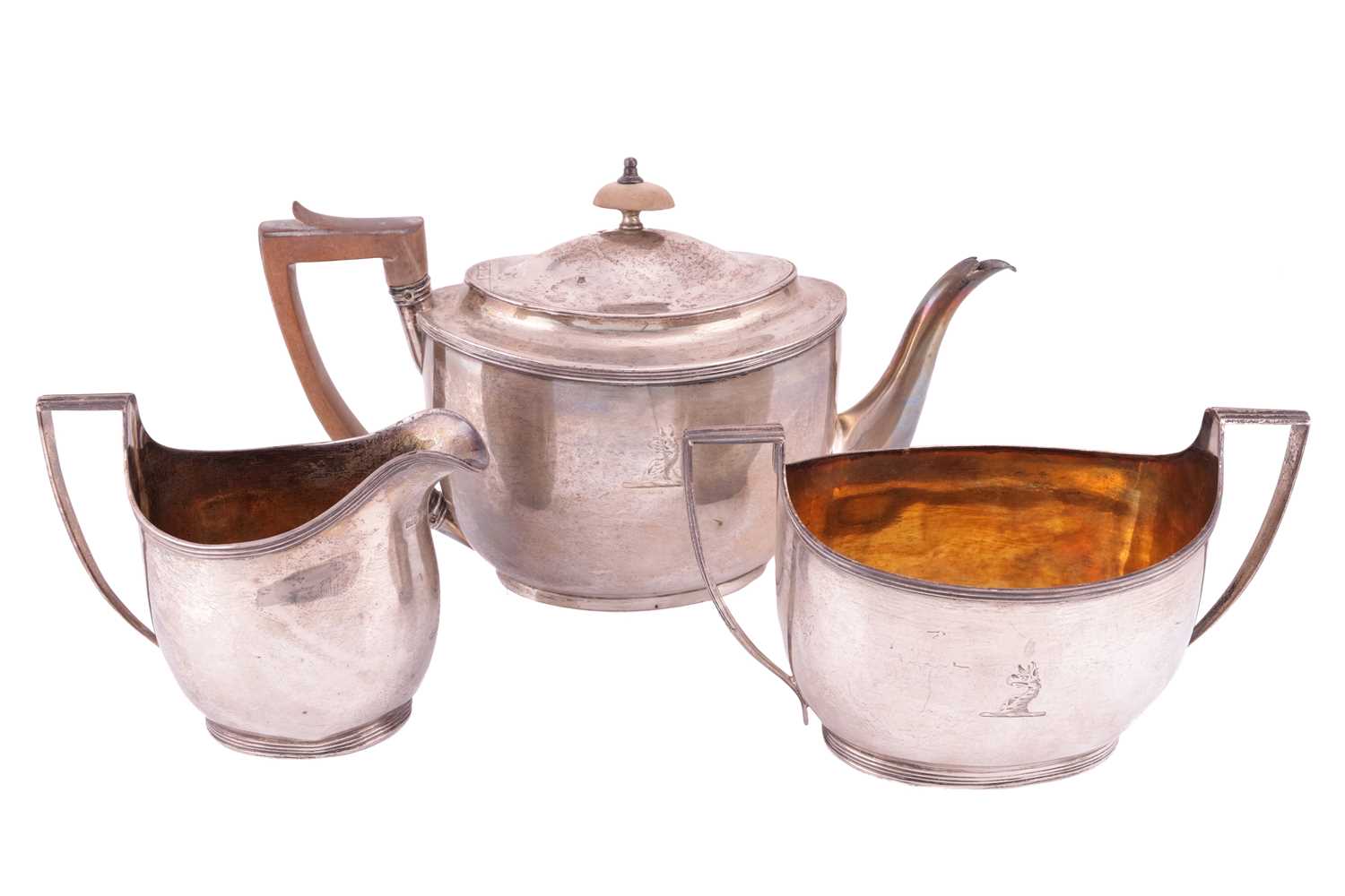 A George III silver matched three-piece tea service, London 1803; comprising a teapot by John Emes, 