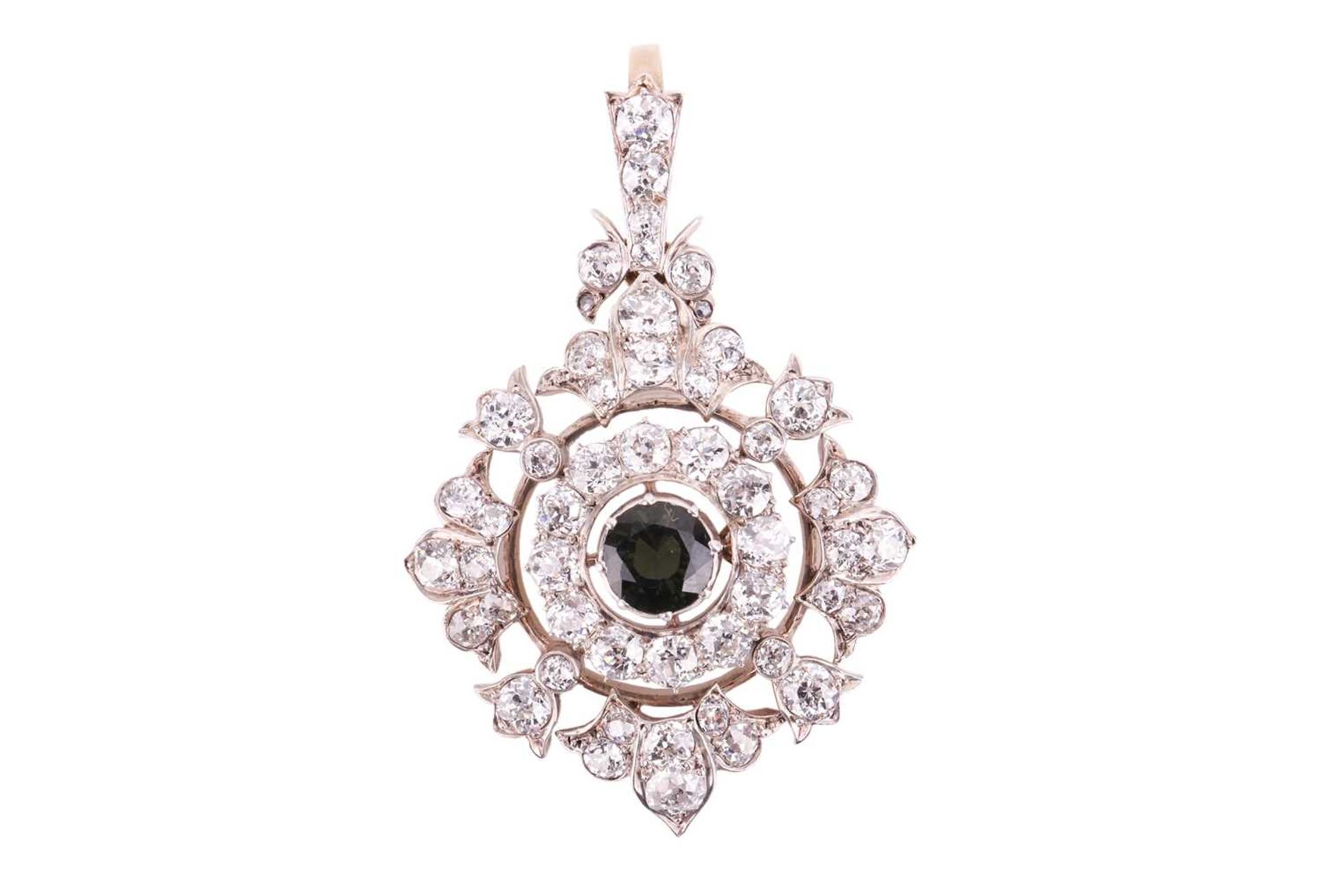 An Edwardian diamond and tourmaline guirlande pendant, with a round centrally-set dark green tourmal