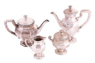 An Art Deco tea service, comprising a teapot, coffee pot, tea caddy and milk jug, each piece of angu