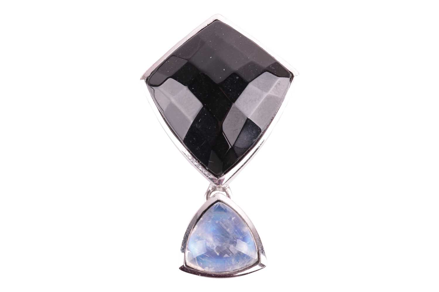 A Whitby jet and labradorite pendant in 9ct white gold, containing a shield-shaped chequerboard face