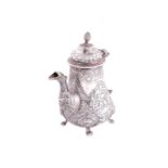 A George III silver coffee pot by William Cripps, London 1776, of pear form, decorated with elaborat