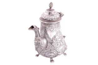 A George III silver coffee pot by William Cripps, London 1776, of pear form, decorated with