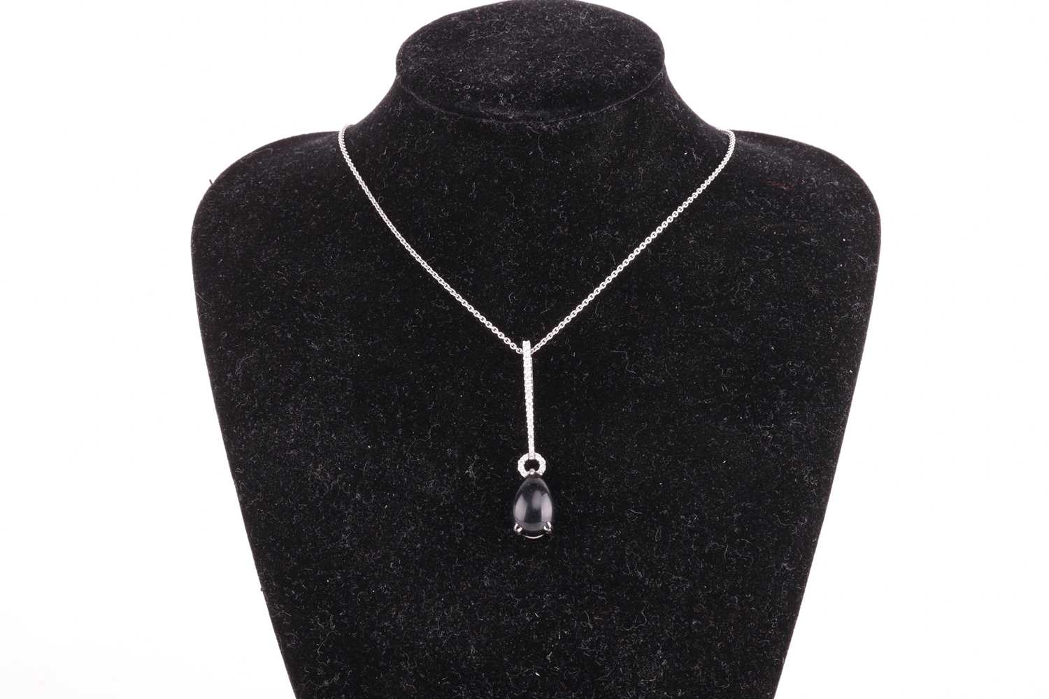 A Whitby jet and diamond drop pendant on chain, featuring a teardrop-shaped jet cabochon of 13.0 x 9 - Image 3 of 3