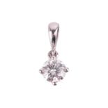 A diamond solitaire pendant, the round brilliant diamond measuring approximately 5.1mm, with an esti