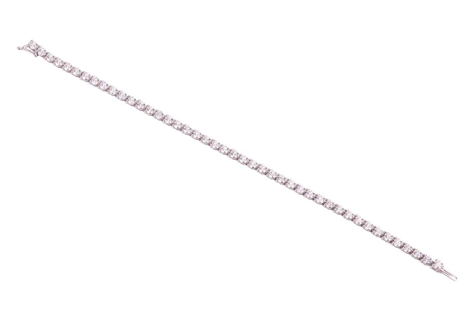 A diamond line bracelet by David Morris, claw set with 44 round brilliant diamonds measuring - Image 2 of 5