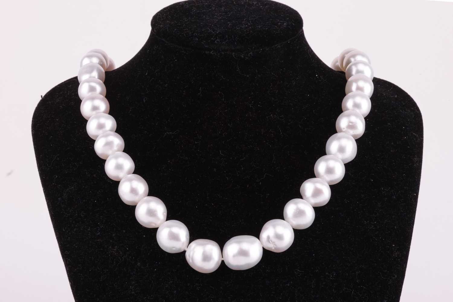 Mikimoto - a single-strand South Sea pearl with a diamond-set clasp, comprising a row of graduated p - Image 3 of 5