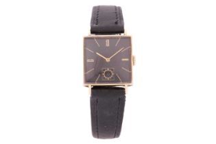 A 1940 IWC Schaffhausen (International Watch Company) 14ct gold watch, featuring a black dial.Serial