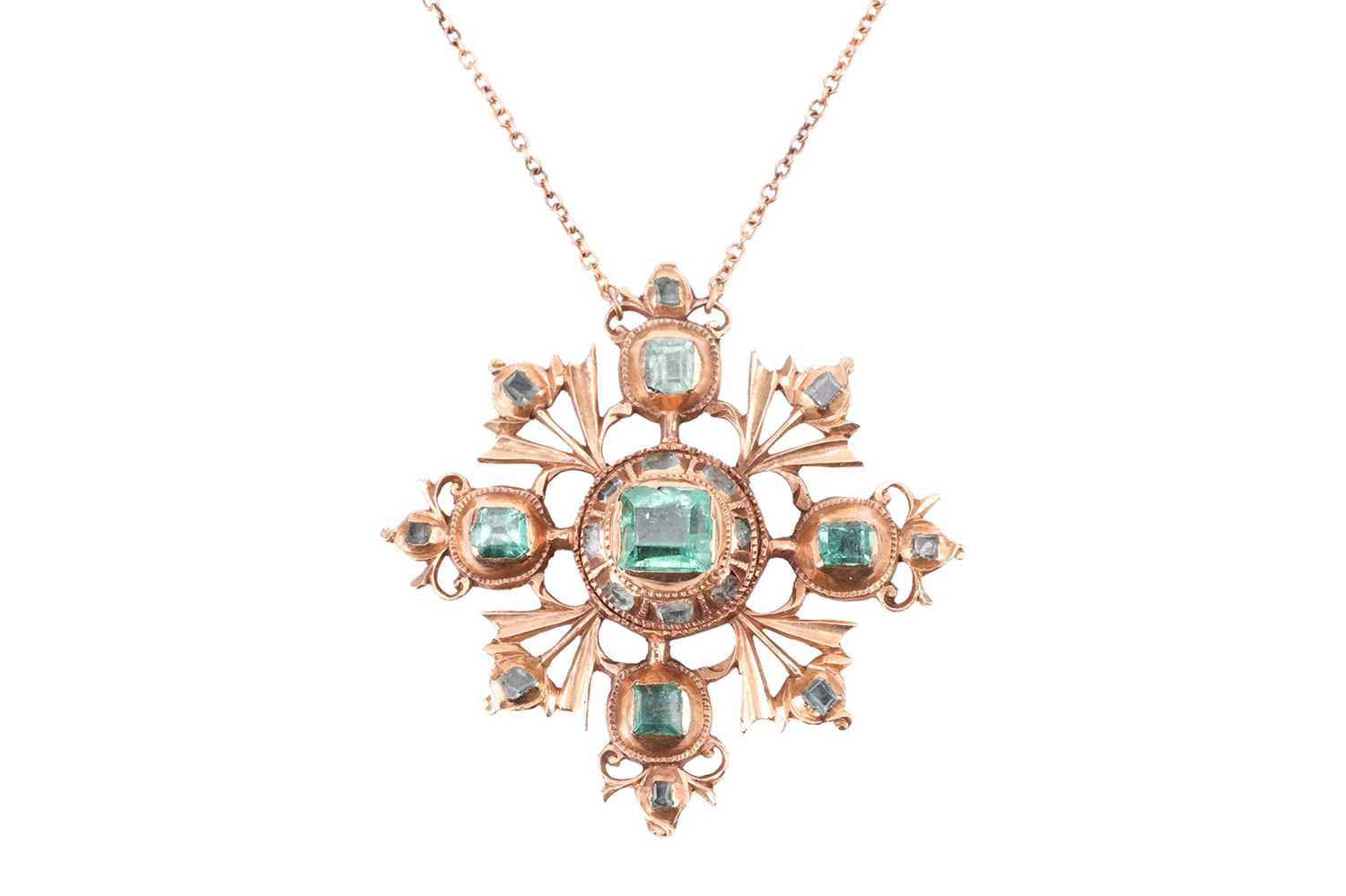 An 18th century Iberian emerald pendant, designed as a cross set with table-cut emeralds, the centra