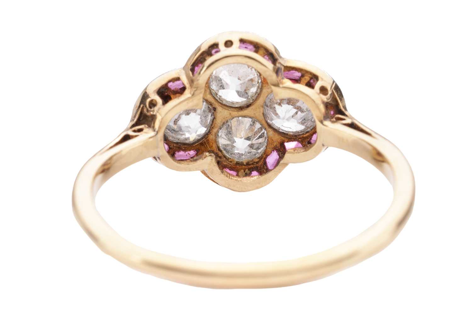An Art Deco diamond and ruby quatrefoil ring, the panel is constructed by four old-cut diamonds with - Image 3 of 4