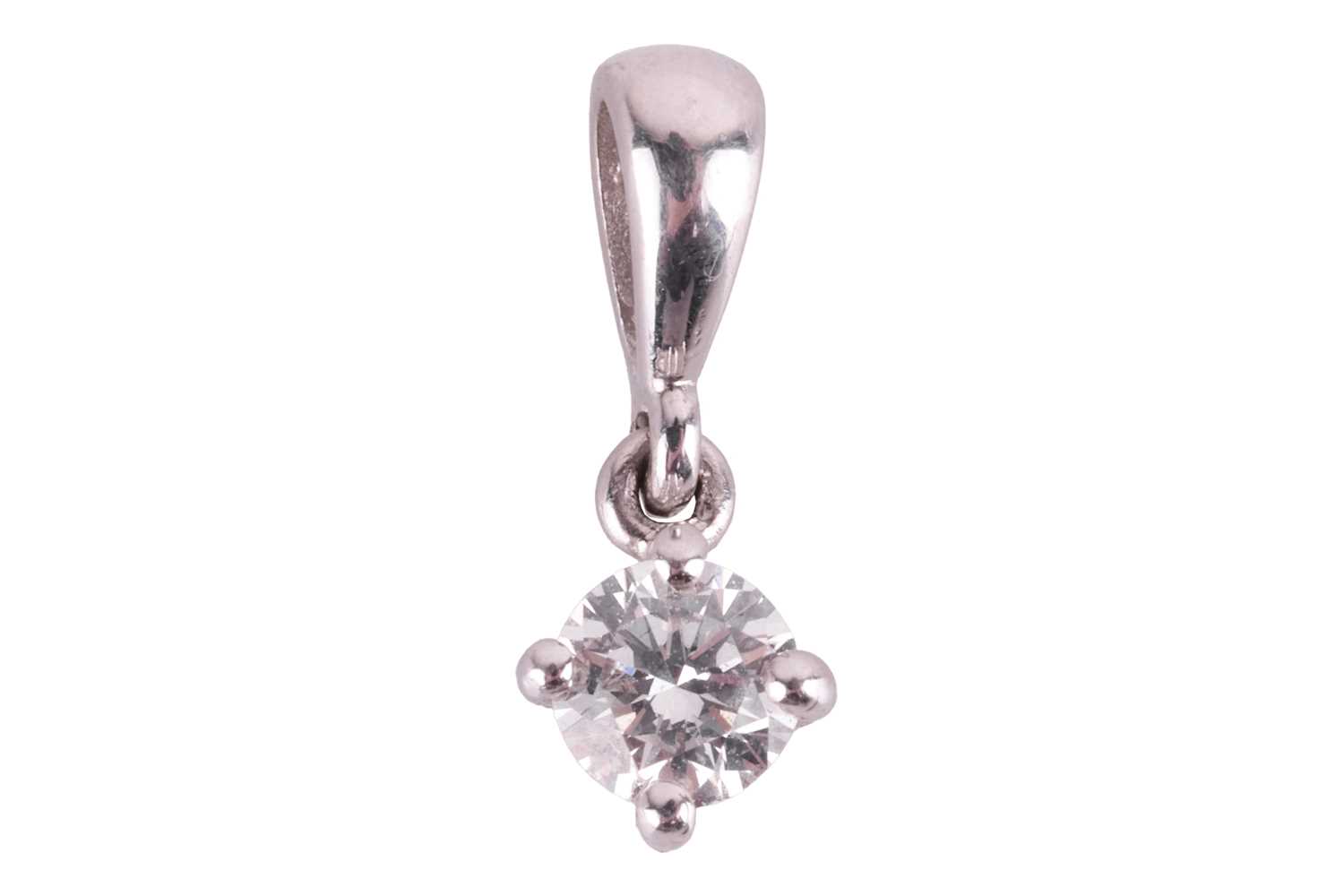 A diamond solitaire pendant, the round brilliant diamond measuring approximately 3.7mm, with an esti