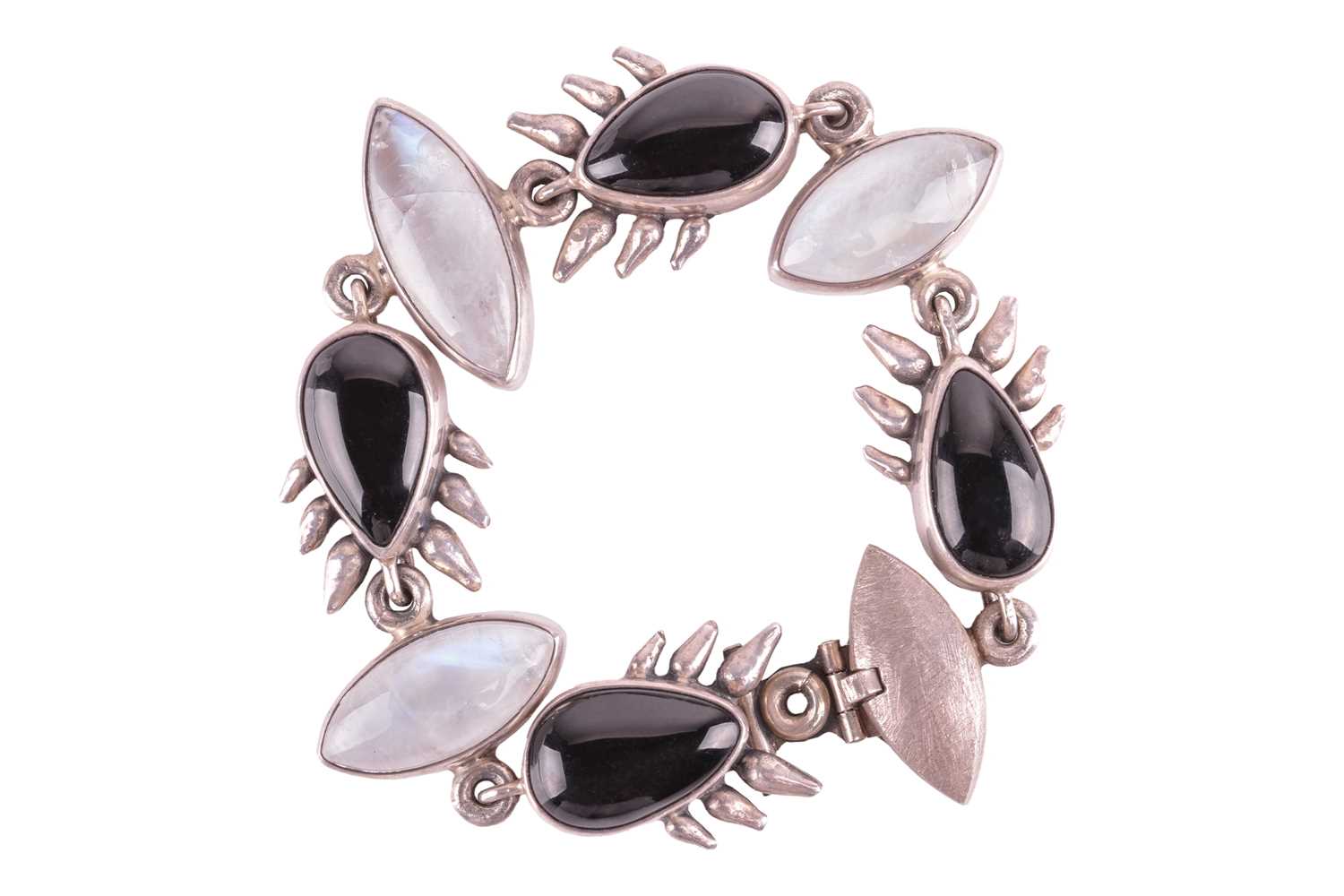 A Whitby jet and labradorite link bracelet in silver, comprising four pear-shaped jets flanking thre - Image 2 of 6