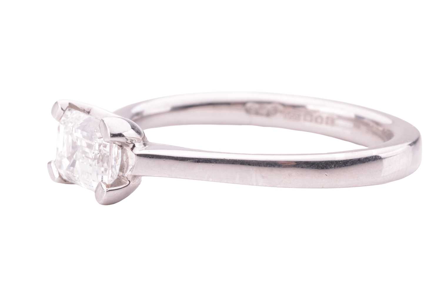 A diamond solitaire ring, featuring an emerald-cut diamond, with an estimated carat, colour and clar - Image 3 of 5