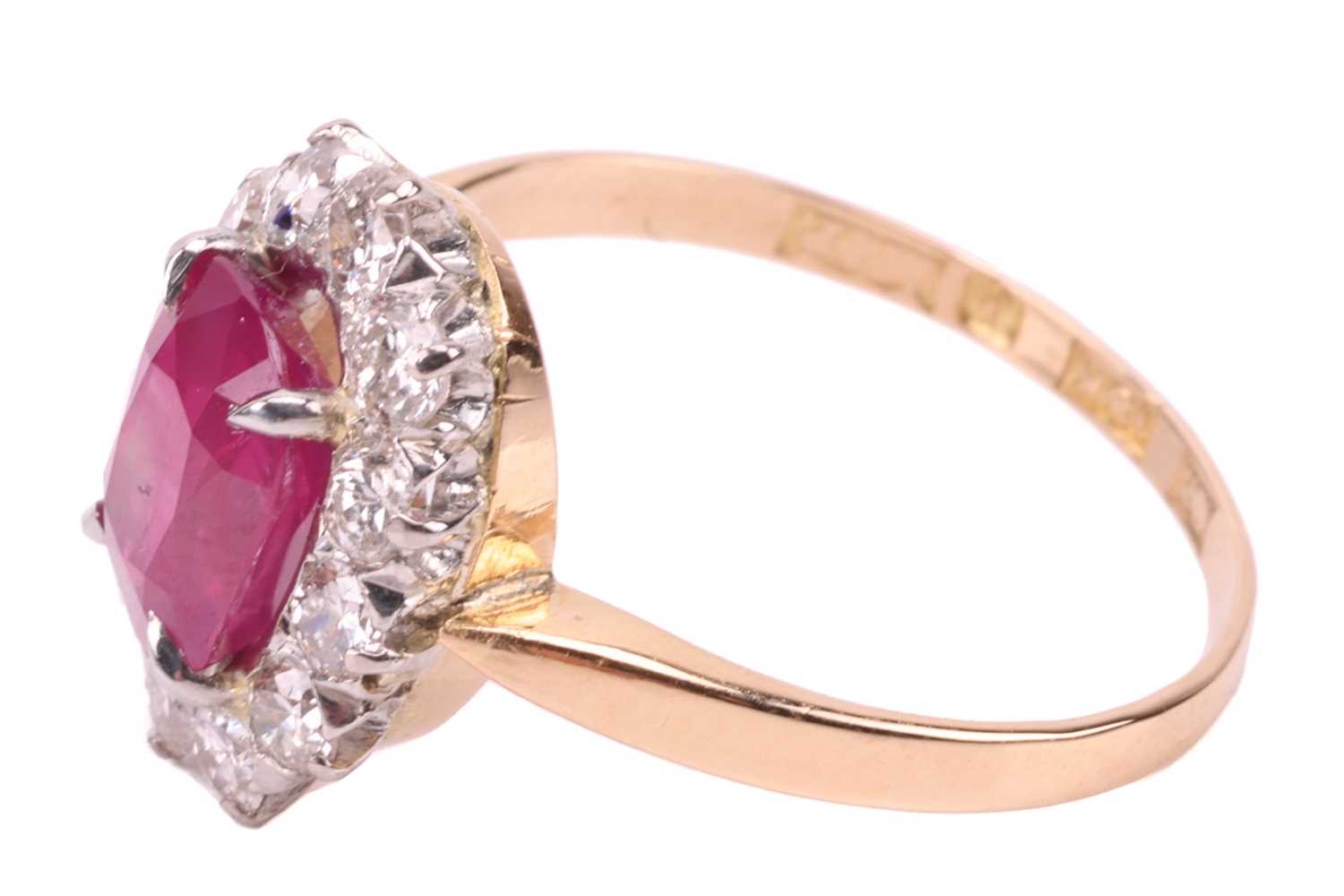 An unheated Burmese ruby and diamond entourage ring, centred with a cushion-cut ruby of 1.37ct, appr - Image 2 of 6