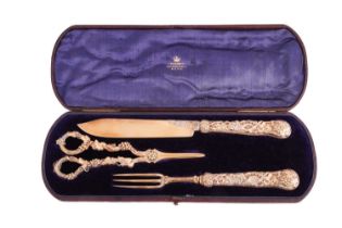 A cased set of late Victorian fruit servers, comprising a knife and fork, and a pair of grape scisso