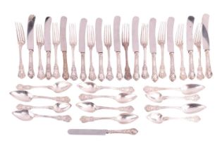 A set of French flatware, including eleven table forks, twelve tablespoons and twelve knives, with n