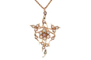 An opal-set floral brooch cum pendant on chain, the openwork mount centred with a flowerhead