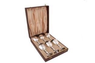 A cased set of six Garrard limited edition commemorative goblets; made to celebrate the silver