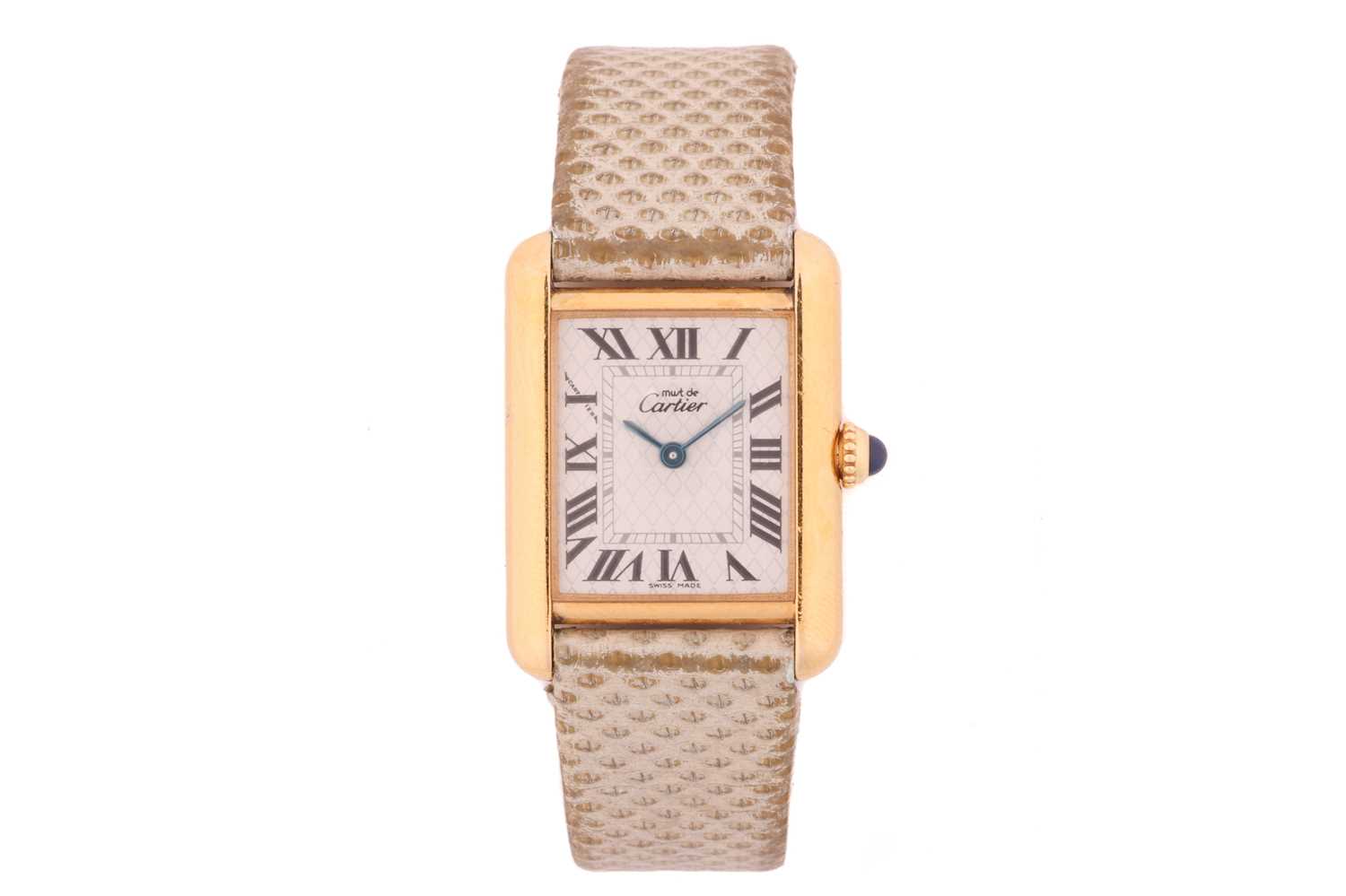 A Must De Cartier Tank Vermeil Lady's WatchModel: 2415Serial: 162742PLCase Material: Silver GiltCase