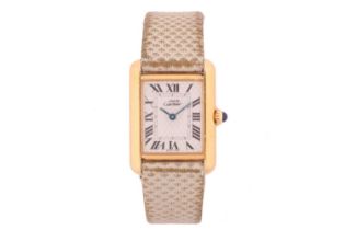 A Must De Cartier Tank Vermeil Lady's Watch Model: 2415 Serial: 162742PL Case Material: Silver