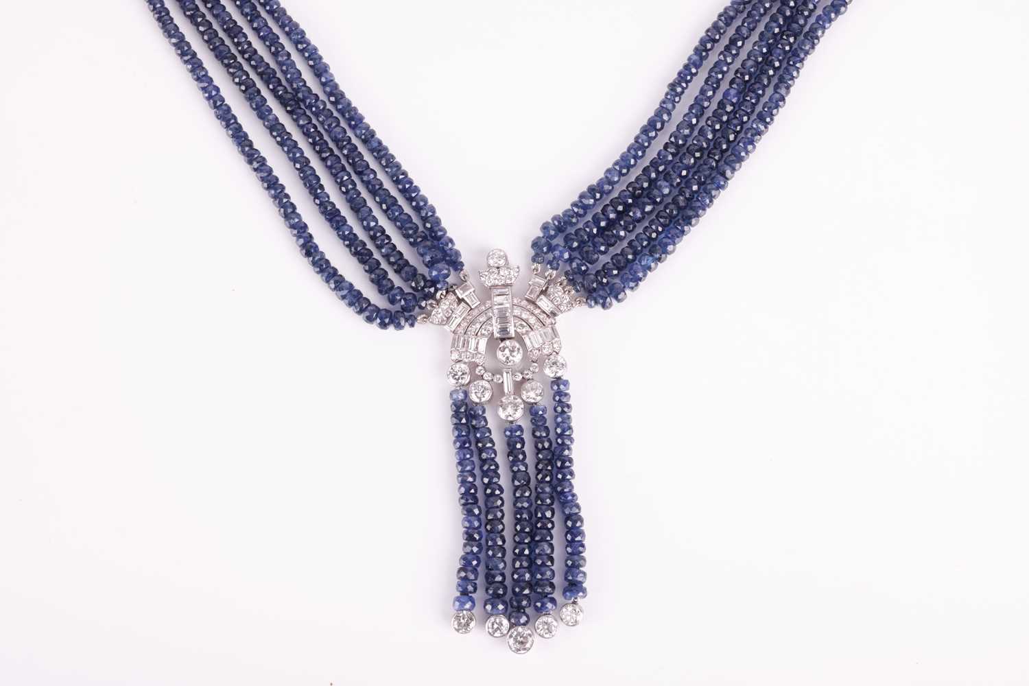 An Art Deco style beaded sapphire and diamond sautoir necklace, composed of five strands of faceted  - Image 3 of 4