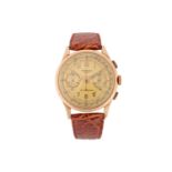 A Chronographe Genève 18ct gold watchSerial: 54 48Year: Circa 1950'sCase Material: 18ct goldCase dia