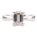 A diamond solitaire ring, set with an emerald-cut diamond with an estimated weight of 1.20ct, in a c