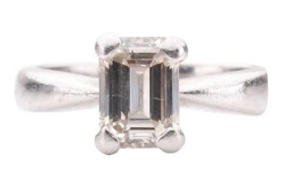 A diamond solitaire ring, set with an emerald-cut diamond with an estimated weight of 1.20ct, in a