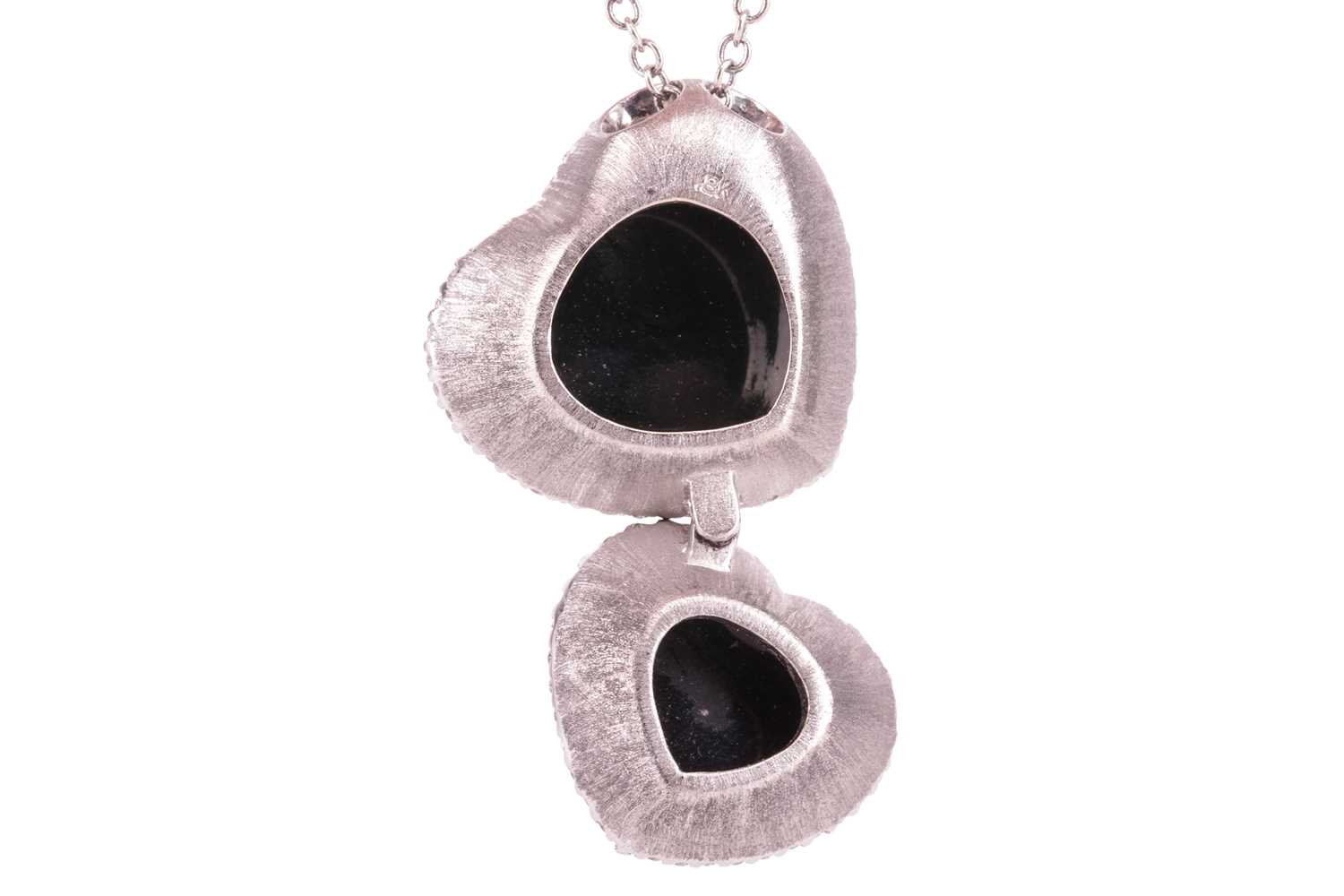 A Whitby jet and diamond double heart pendant on chain, featuring two heart-shaped jet cabochons, fr - Image 2 of 3