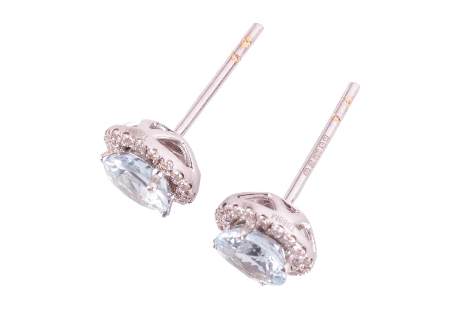 A pair of aquamarine and diamond halo earrings, each aquamarine measuring approximately 6.1mm, with  - Image 2 of 4