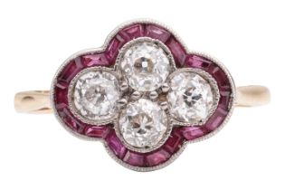 An Art Deco diamond and ruby quatrefoil ring, the panel is constructed by four old-cut diamonds